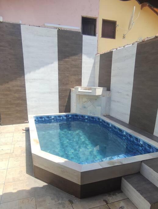 Piscina e Churrasqueira 8 minuto a pé da Praia in Mongagua, Brasil