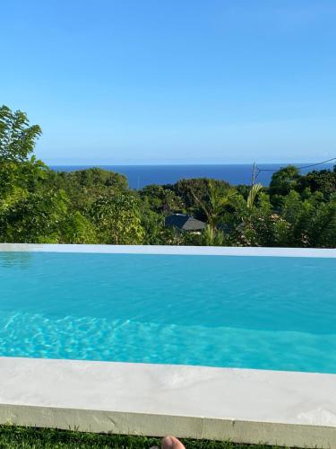 Villa Mango Uluwatu ocean and jungle view — 4-Star Luxury Hotel in Pecatu, Indonesia