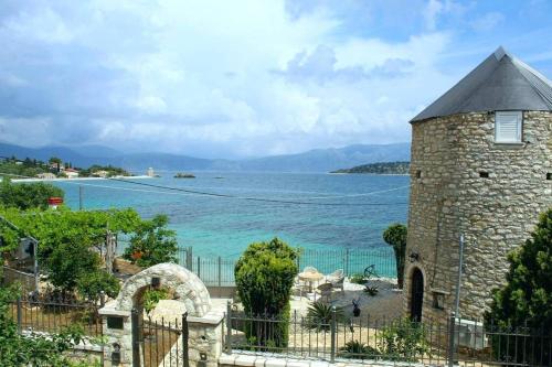 GT Traditional Windmill in Kalamos, Greece