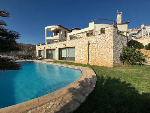 Stone Villa Saronida — 4-Star Luxury Hotel in Saronida, Greece