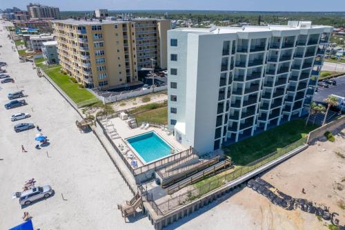 Ocean View with a beachfront pool at Ocean Trillium 301 — 4-Star Luxury Hotel in New Smyrna Beach, United States