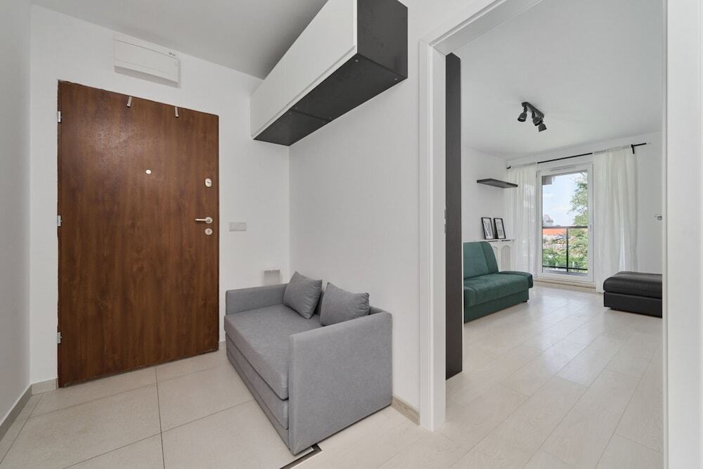 Spacious Apartment Dmowskiego by The River with Parking & Balcony by Noclegi Renters — 4-Star Luxury Hotel in Wroclaw, Poland