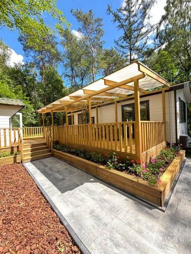 Bosrijk Chalet Veranda Honden 21080799 — Doornspijk