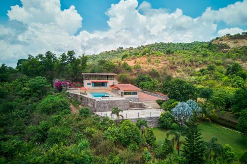 StayVista's Lake Mansion Lakeside Villa with Mountain View Large Pool & Sprawling Lawn — 5-Star Luxury Hotel in Lonavla, India