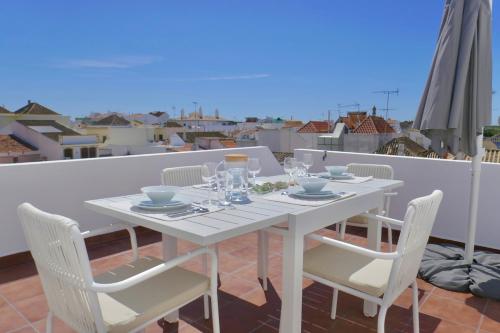 Escape to a terrace over Tavira’s history in Tavira, Portugal