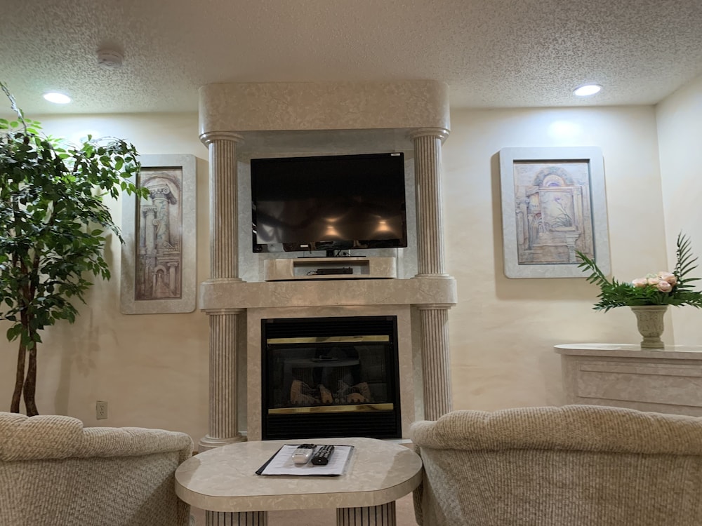 Designer Inn & Suites - photo 20