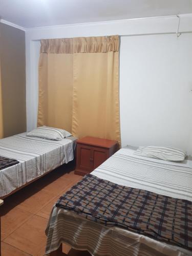 Habitación con doble cama privada en Talara centro in Talara, Peru