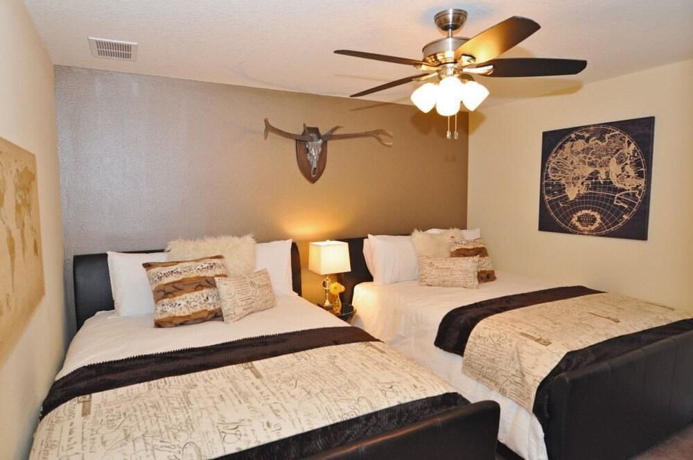 Fabulous 8 Bed 5 Bath Pool Home in Championsgate Golf Resort - photo 4