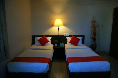 Orange Corner Hotel Airport Pickup Drop Available 24x7 — Yelahanka