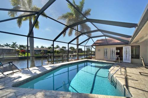 Villa Connie Remodeled gulf access electric heated pool home w game room & bikes SWFL Rentals — 4-Star Luxury Hotel in Cape Coral, United States