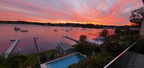 Absolute Waterfront Lakehouse Fishing Point Waterfront Pool Jetty in Toronto, Australia