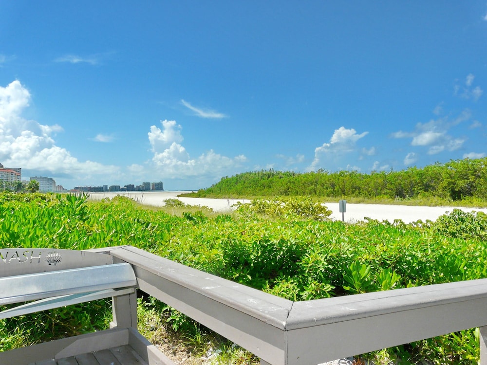 Beachfront condo in resort style community with pool - photo 54