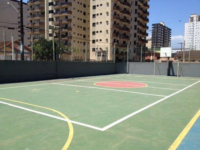Apto 2 quartos em Condomínio com quadra a 50m da areia da Praia in Praia Grande, Brasil
