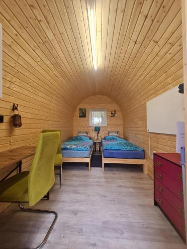 Glamping Pod im Wald mit Einzelbetten — hotel in Nordholz