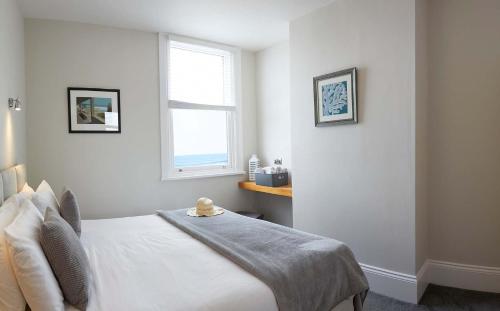 Apartment 18 The Moorings Right on the front Beautifully furnished Light bright and Airy