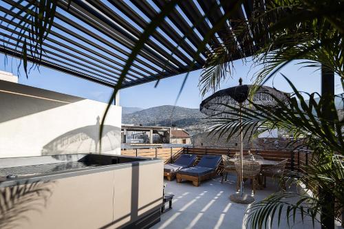 Pappous & Giagia Central Suites By IdealStay Experience — 4-Star Luxury Hotel in Malia, Greece
