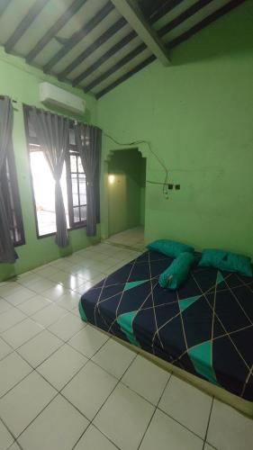 Homey Kost 99 - last minute hotel in Mlonggo