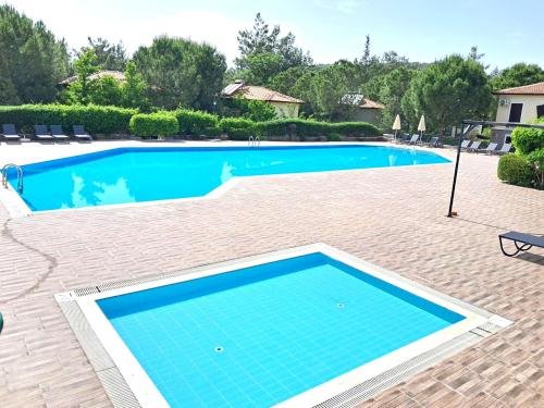 The Villages C3 Suite Apart Havuz Barbeku Balkon Teras — 4-Star Luxury Hotel in Oeluedeniz, Turkey