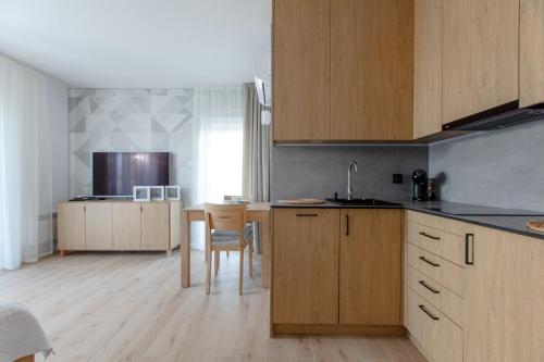 Apartament Kremowy by Major Domus Club — 4-Star Luxury Hotel in Dziwnow, Poland