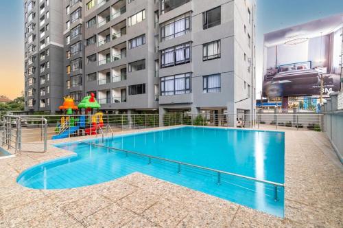 Comfort living one bedroom apartment with fully equipped gym swimming pool private parking space child play area and amazing scenic views