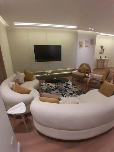 Ground floor hotel apartment with garden for rent in Westown Beverly Hills Compound — hotel near Sphinx International Airport