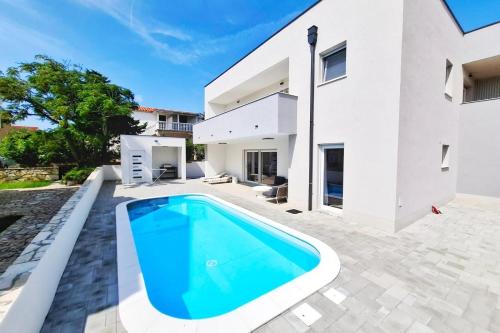 Family friendly house with a swimming pool Povljana Pag 24256 — 4-Star Luxury Hotel in Povljana, Croatia