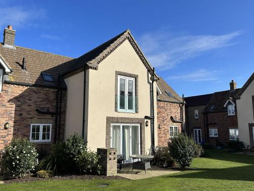 A Wave From It All Part of the The Bay Filey Holiday Village with pool gym and direct beach access pub restaurant tennis and meadows walks