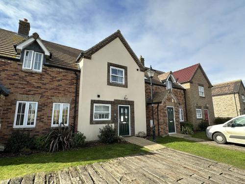 A Wave From It All Part of the The Bay Filey Holiday Village with pool gym and direct beach access pub restaurant tennis and meadows walks