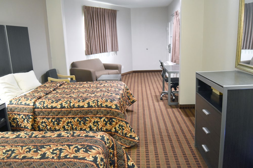 Camelot Inn & Suites Highway 290 NW Freeway - photo 14