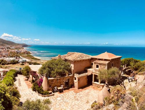 Villa Tirnanog — 4-Star Luxury Hotel in Castelsardo, Italy