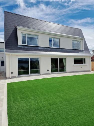 Buncrana Beach House by Wild Atlantic Wanderer — 4-Star Luxury Hotel in Buncrana, Republic of Ireland