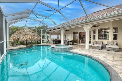 Newly renovated 3 bed 3 bath in the Four Mile Cove area w. heated pool and spa. Gulf access in Cape Coral, United States