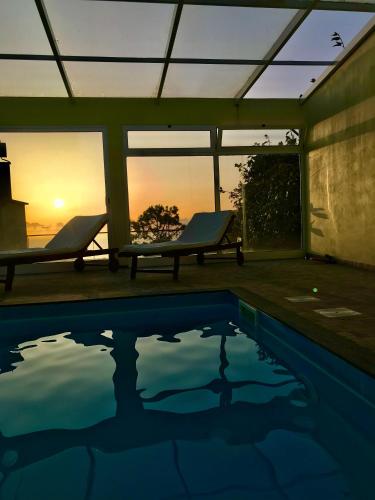Casa da Relva com Piscina Aquecida Interna — 4-Star Luxury Hotel in Arco Da Calheta, Portugal