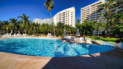 A pie de mar en zona hotelera 1BR condo In Monarca Ixtapa no pagas brazalete — 4-Star Luxury Hotel in Ixtapa, Mexico