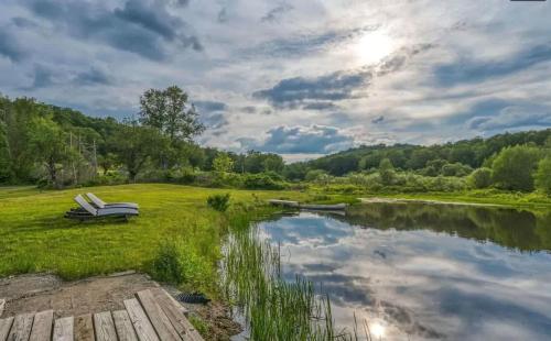Chic Renovated Chalet With Private Pond 21429904 — Roscoe
