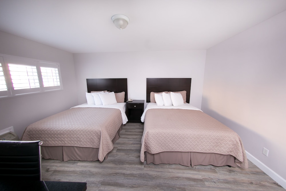 Metropolitan Inn & Suites - photo 5