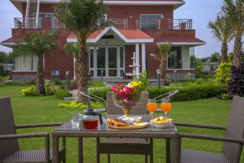 StayVista at Hillside Paradise 4BHK Villa with Jacuzzi kids play area view of Aravalli Hills