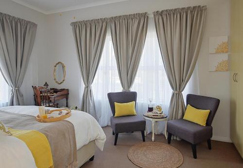 Unwind at Coral 2BR Bloubergstrand Beach Apt Walk to Beach