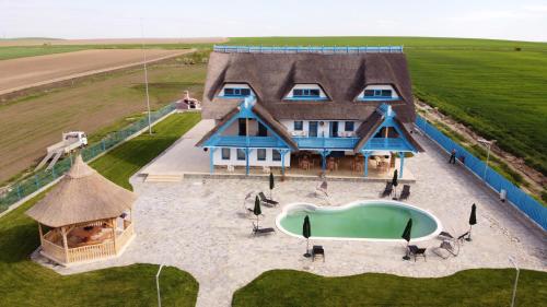 Pensiunea Dolosman — 4-Star Luxury Hotel in Jurilovca, Romania