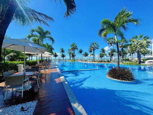 Viva o Paraíso Condomínio Exclusivo Beira Mar e Lazer Completo - carbon neutral hotel in Unknown City
