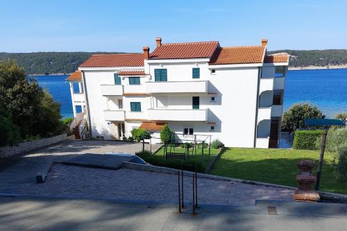 Apartments by the sea Supetarska Draga Gonar Rab 24423 — 4-Star Luxury Hotel in Rab, Croatia