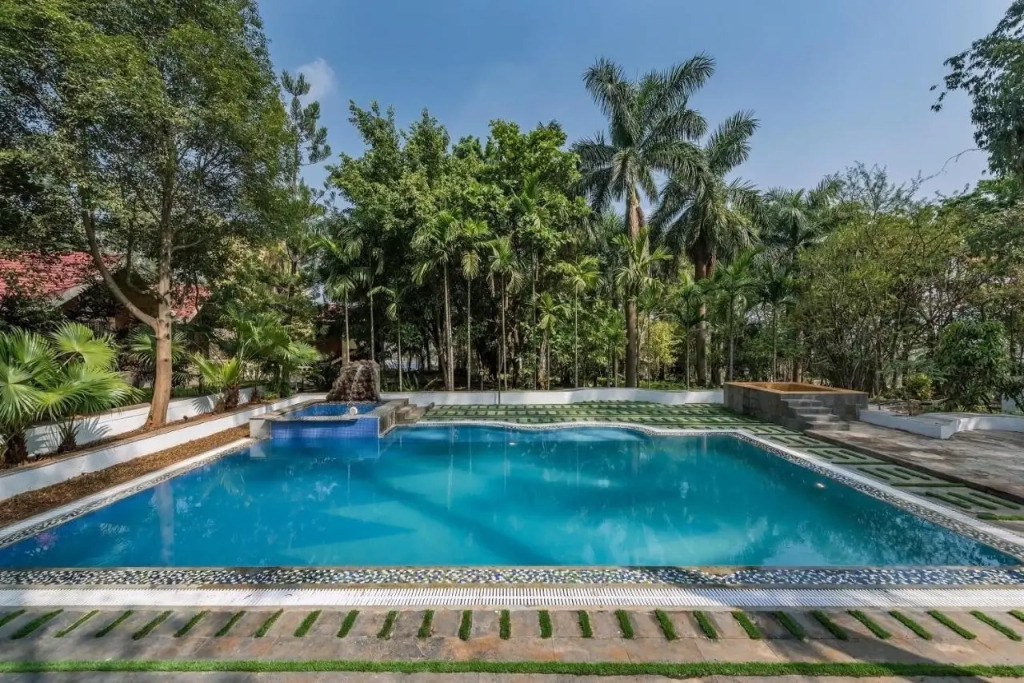 SaffronStays Foresta by the Lake 6BR veg only pool estate with lake views lawns gazebo & sports court in Kamshet in Pune, India