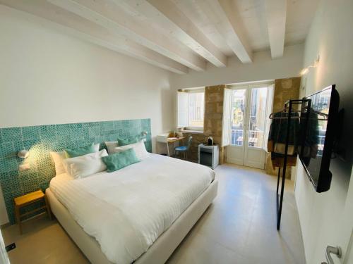Residence Le Tre Grazie Appartamento Tàlia — 4-Star Luxury Hotel in Siracusa, Italy