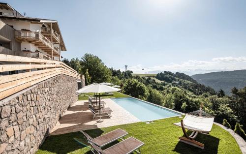 Pippos Mountain Lodge — 4-Star Luxury Hotel in Soprabolzano, Italy