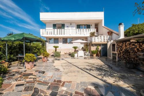 Apartment seaside serenity — 4-Star Luxury Hotel in Porto Cesareo, Italy