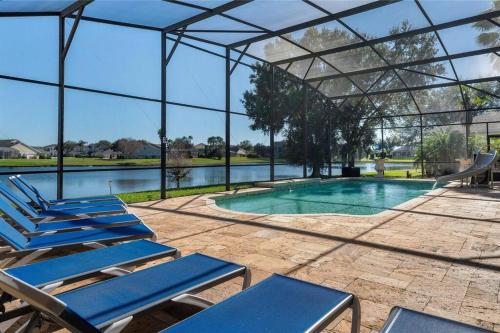 BRAND NEW Lakefront 9BR Pool Hot Tub Outdoor Kitchen BBQ Theater 2 miles Disney — 4-Star Luxury Hotel in Orlando, United States