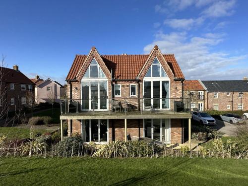 Pearl & Spice Hideaways 2 two bedroom cottages nearby Part of the The Bay Filey Holiday Village with pool gym and direct beach access pub restaurant tennis and meadows walks