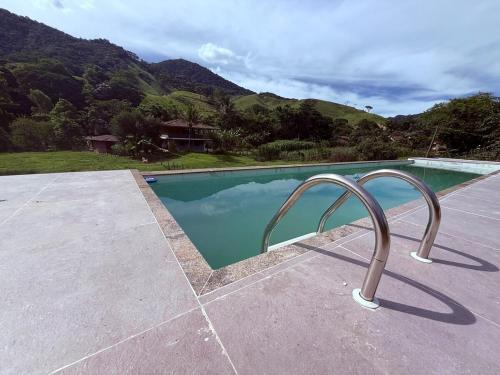 Sítio aconchegante com piscina sauna e churrasqueira in Macae, Brasil