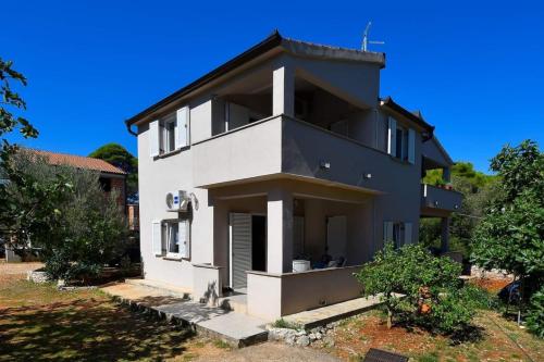 Apartments by the sea Susica Ugljan 20758 — 4-Star Luxury Hotel in Ugljan, Croatia