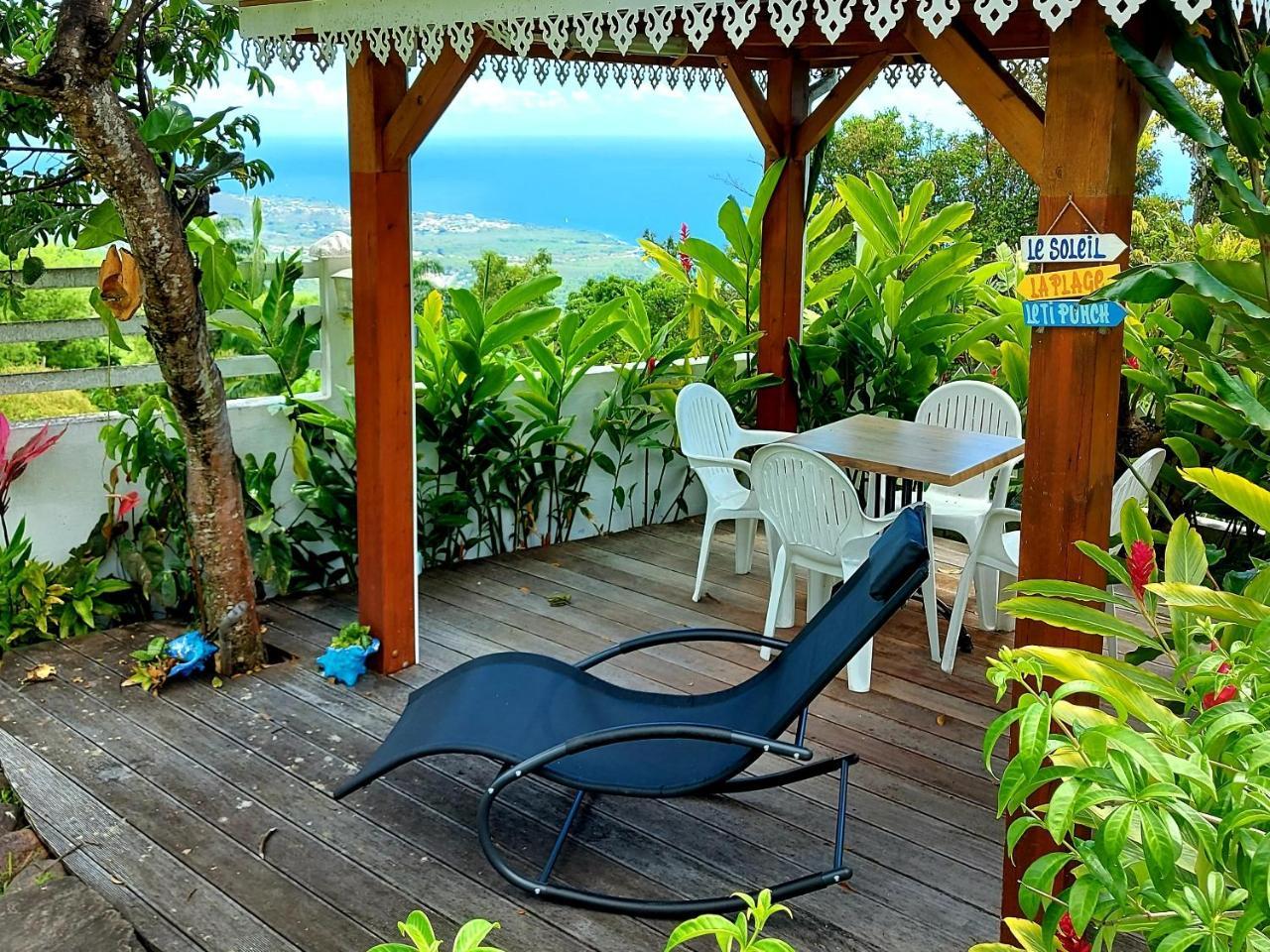 Bélavue & SPA Privé avec vue panoramique sur mer jardin créole paysager jacuzzi privé in Bouillante, Guadeloupe